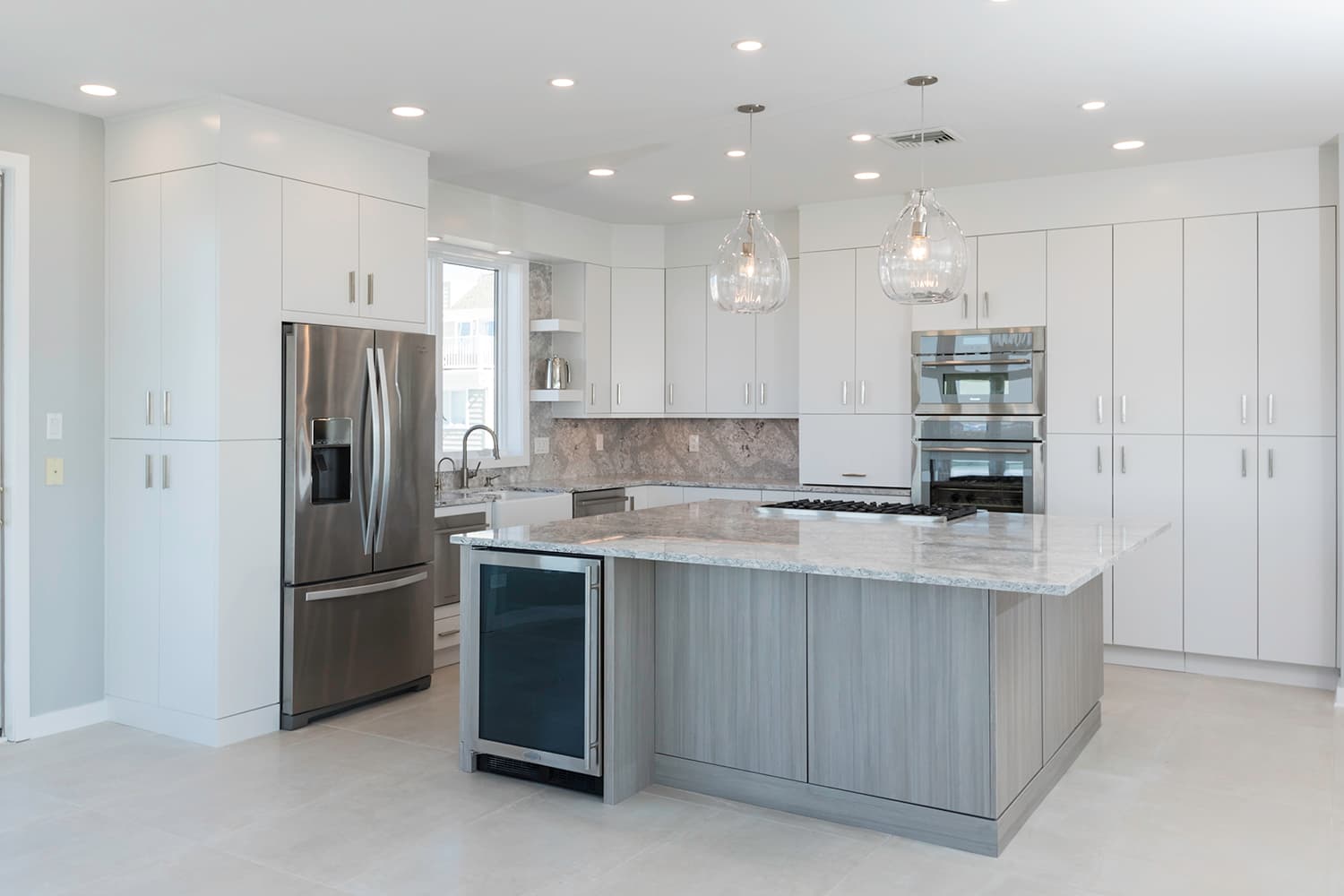 Contemporary White Laminate Kitchen With Gray Island
