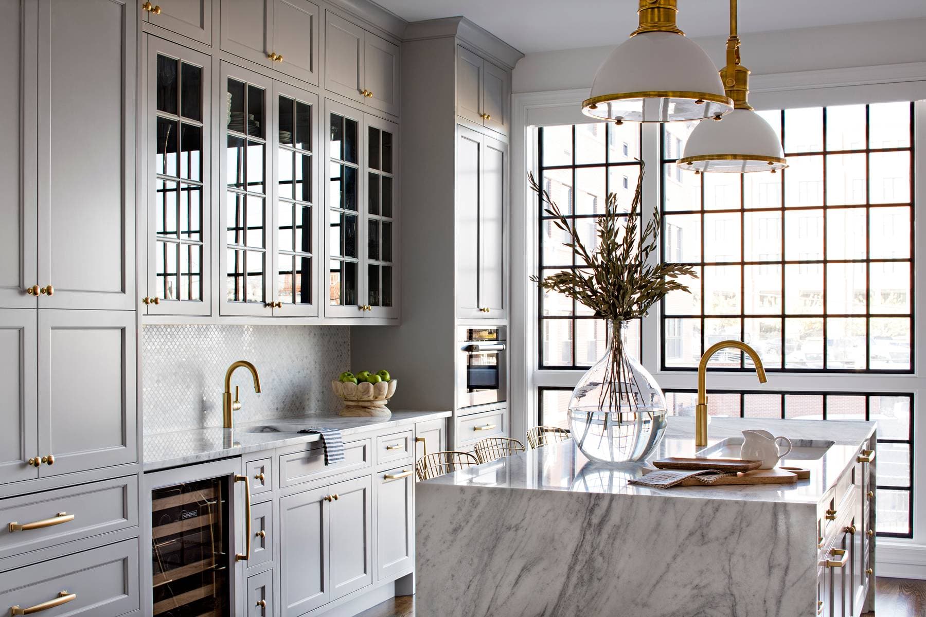 Gray Kitchen With Brass Accents