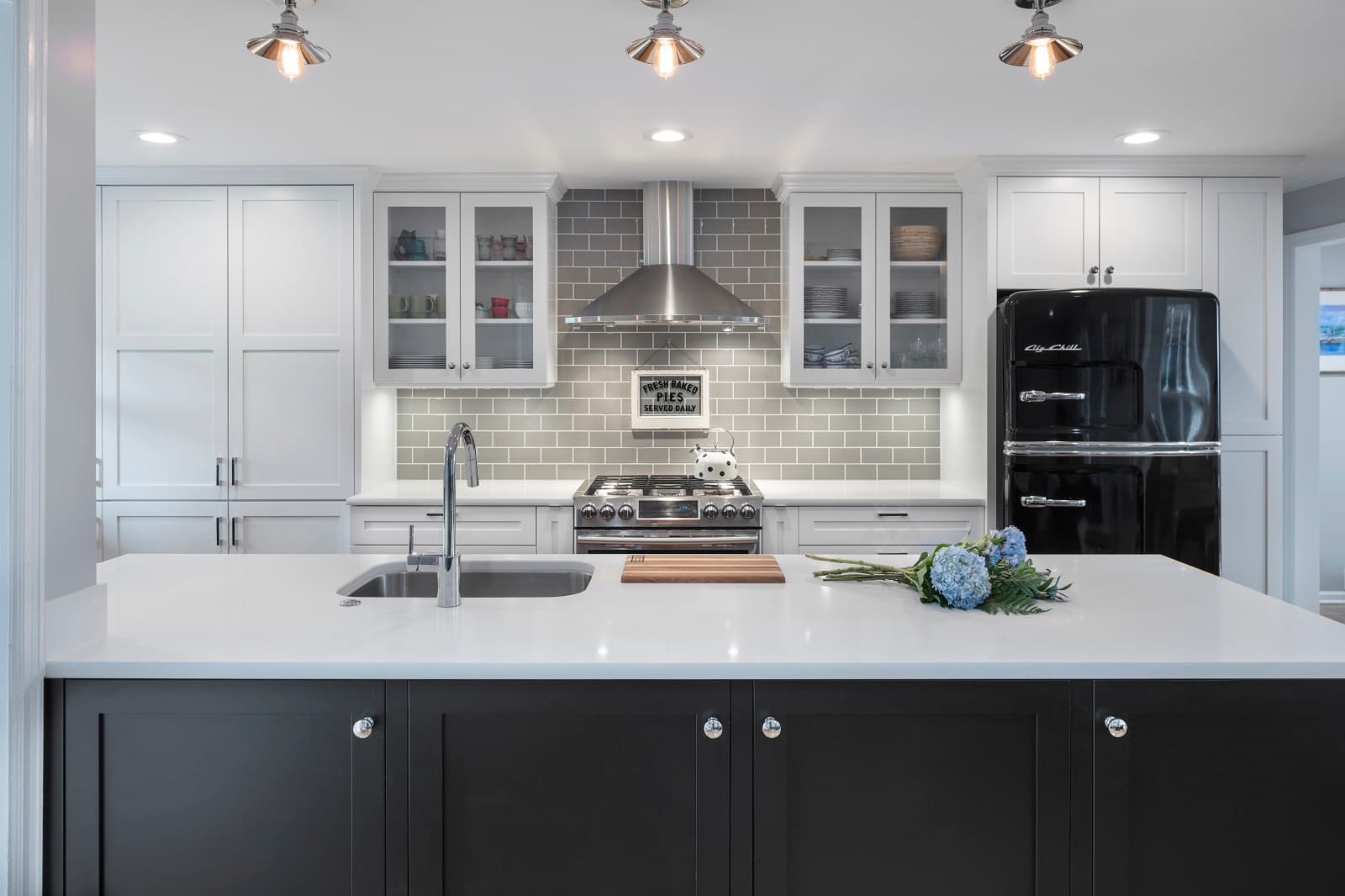 Modern Farmhouse Kitchen With Black Island