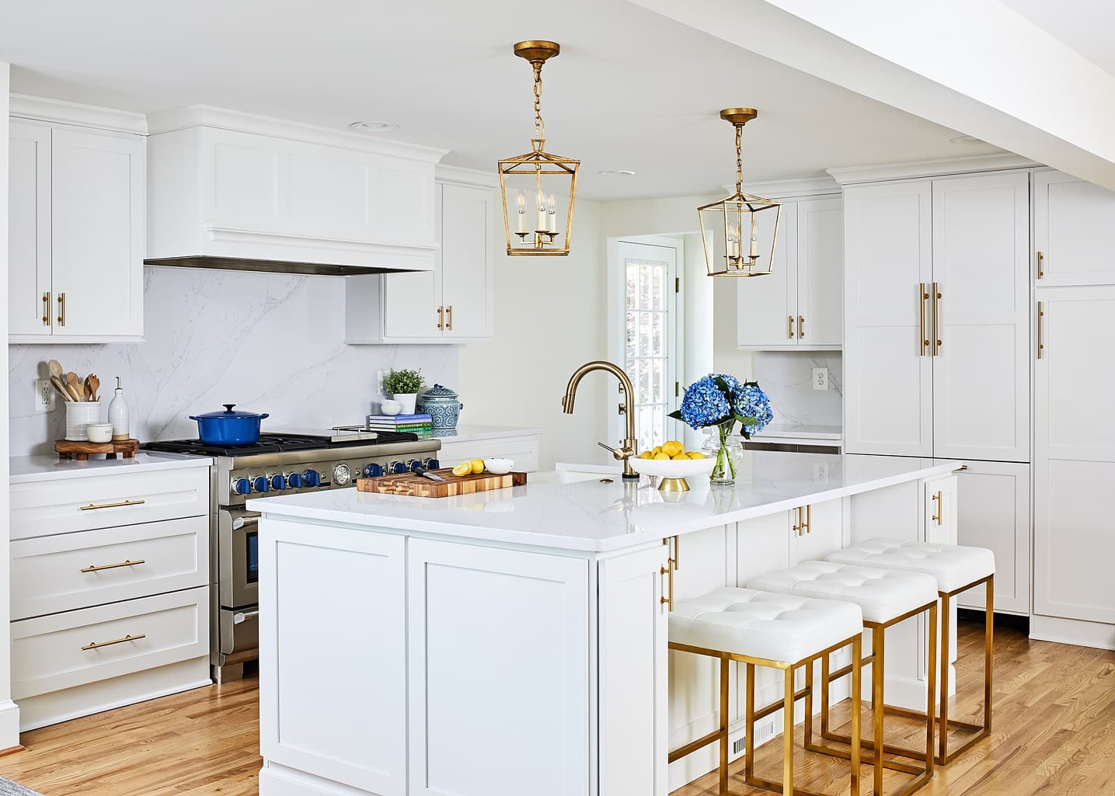 Transitional Painted White Kitchen With Gold Accents